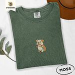 Moss Comfort Colors T-shirt embroidered with a fawn and cream English bulldog puppy in a red collar chewing a string of Christmas lights