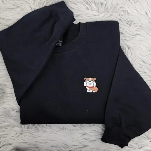 Black English bulldog crewneck folded with the mini bulldog pocket logo embroidery on the chest