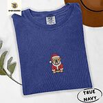 True Navy Comfort Colors T-shirt embroidered with a fawn English bulldog in a red Santa suit, black belt and Santa hat
