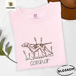 Blossom Comfort Colors T-shirt embroidered with a liver and white English pointer on point among cattails and grass, with an optional name stitched below