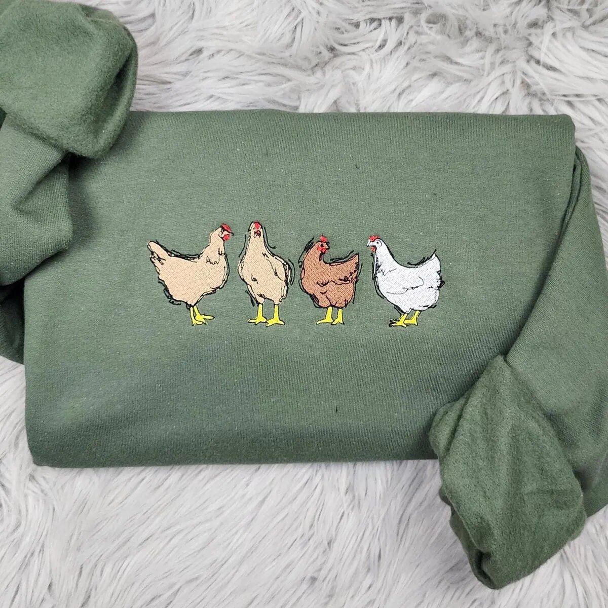 Farm Hens Sweatshirt – Military Green Military Green chicken sweatshirt with the four embroidered hens centered on the chest