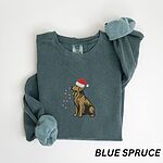 Blue Spruce crewneck sweatshirt laid flat, embroidered with a sitting golden retriever in a Santa hat holding Christmas lights