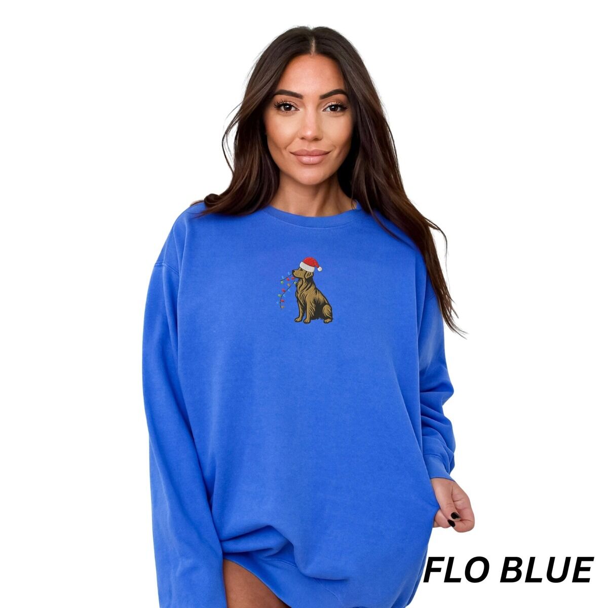 Festive Golden Retriever Sweatshirt – Flo Blue Woman in an oversized Flo Blue crewneck sweatshirt embroidered with a golden retriever in a Santa hat and Christmas lights