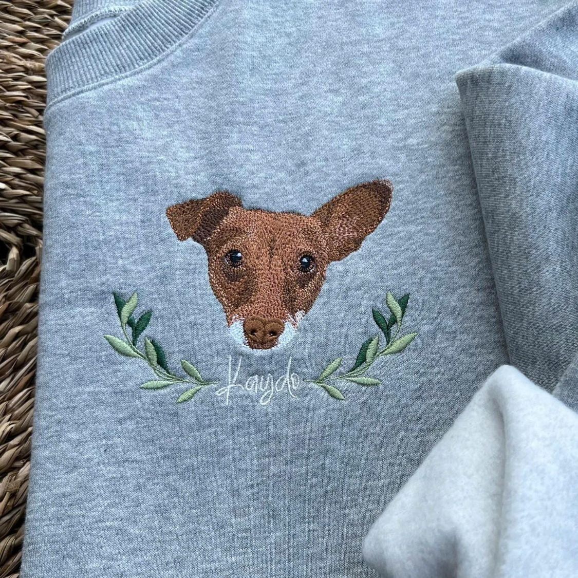 Floral Dog Portrait Sweatshirt – Olive Wreath Embroidered brown and white dog portrait with an olive branch wreath and the name Kaydo in white script on a sport grey sweatshirt