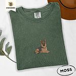 Moss Comfort Colors T-shirt embroidered with a black and tan German shepherd lying down with its ears up and its paws forward