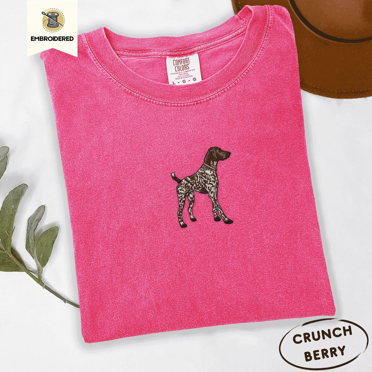 German Shorthaired Pointer Shirt – Crunchberry Crunchberry Comfort Colors T-shirt embroidered with a standing liver and white German shorthaired pointer in a tan collar