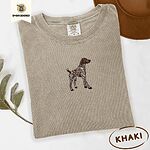 Khaki Comfort Colors T-shirt embroidered with a standing liver and white German shorthaired pointer in a tan collar