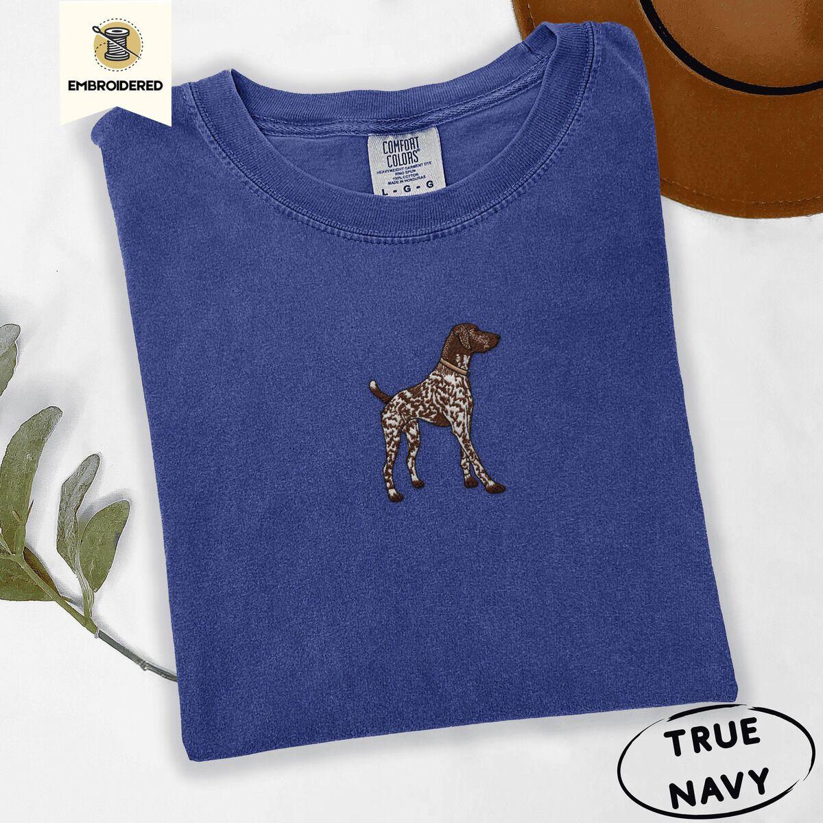 German Shorthaired Pointer Shirt – True Navy True Navy Comfort Colors T-shirt embroidered with a standing liver and white German shorthaired pointer in a tan collar