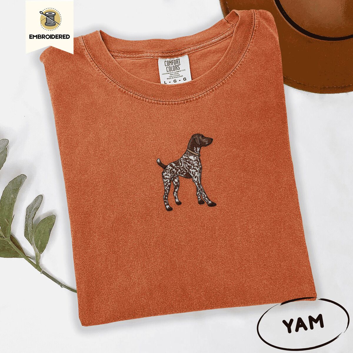German Shorthaired Pointer Shirt – Yam Yam Comfort Colors T-shirt embroidered with a standing liver and white German shorthaired pointer in a tan collar