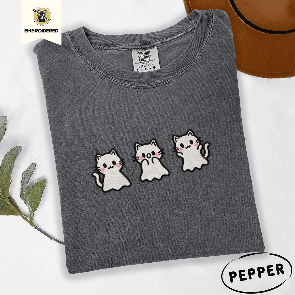 Ghost Kitten Shirt – Pepper Pepper Comfort Colors T-shirt embroidered with three white ghost kittens with pink cheeks and black outlines