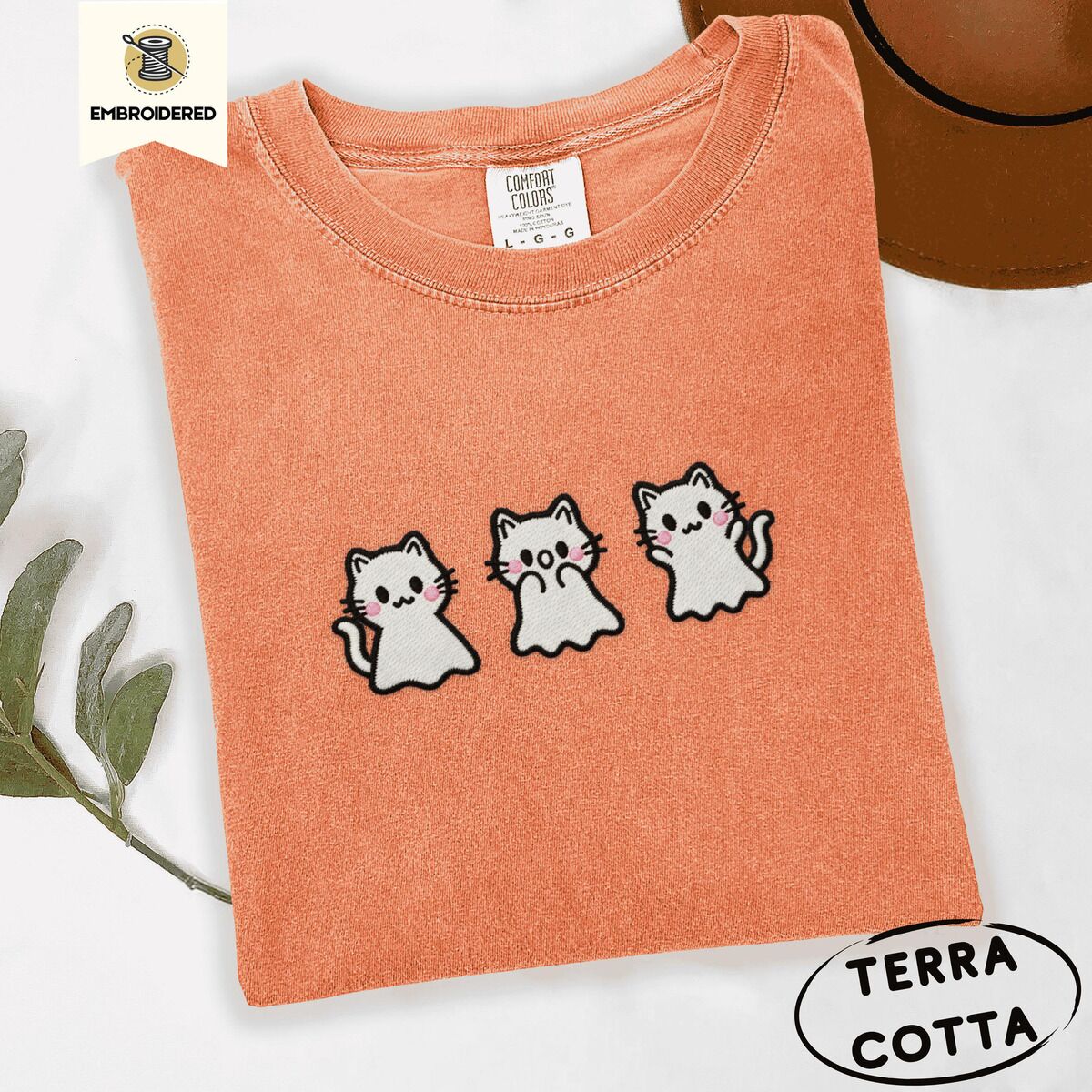 Ghost Kitten Shirt – Terracotta Terracotta Comfort Colors T-shirt embroidered with three white ghost kittens with pink cheeks and black outlines