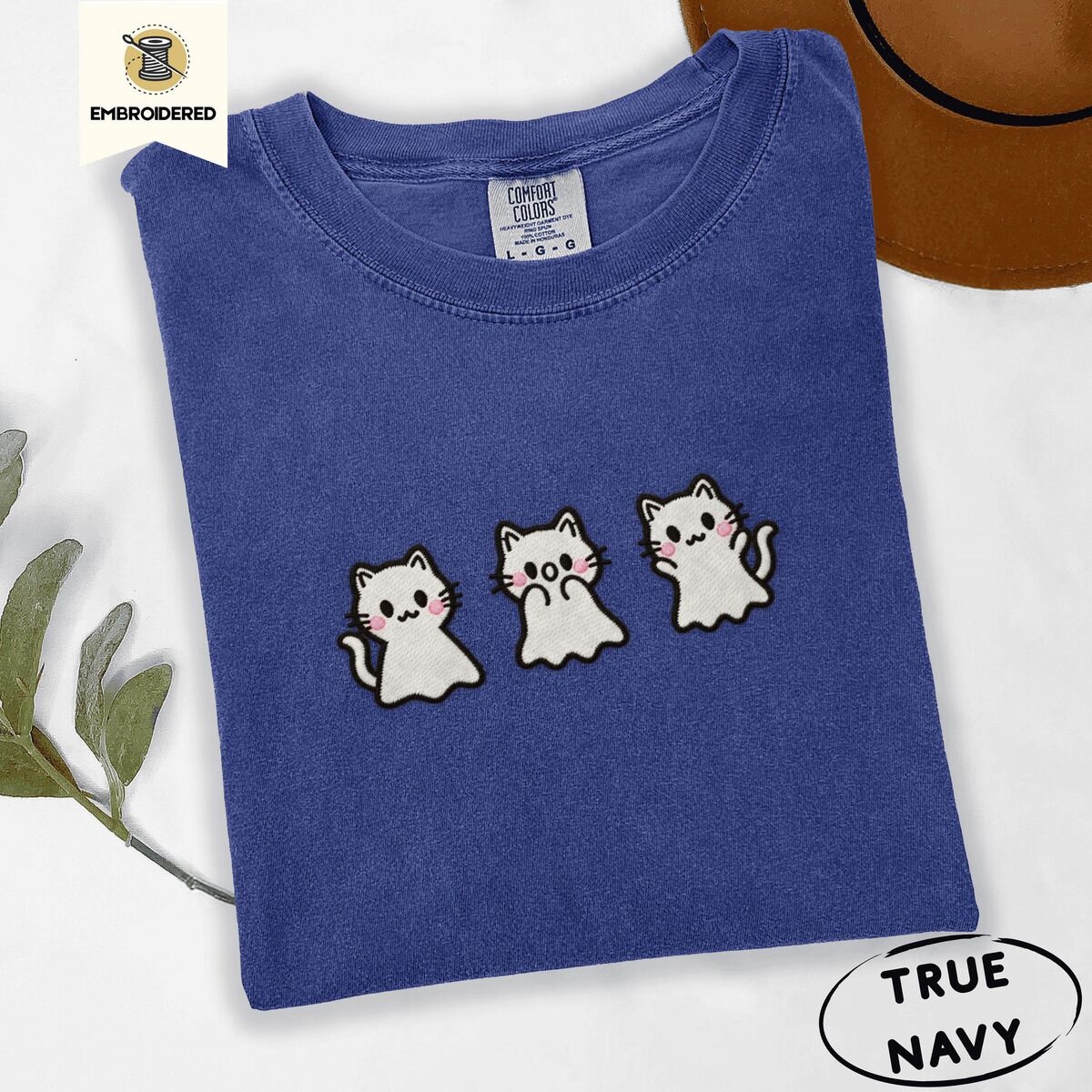 Ghost Kitten Shirt – True Navy True Navy Comfort Colors T-shirt embroidered with three white ghost kittens with pink cheeks and black outlines