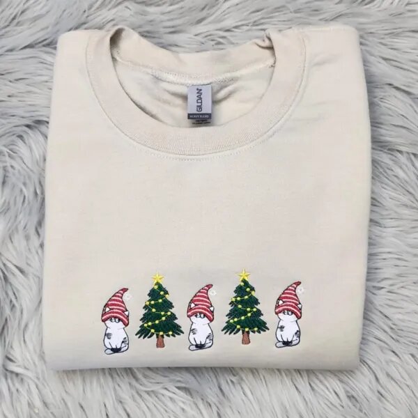 Gnome cat sweatshirt in Sand with three white cats in striped gnome hats and two Christmas trees across the chest