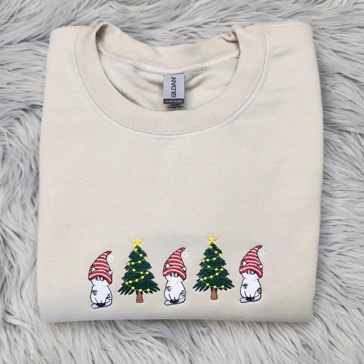 Gnome Cat Sweatshirt – Sand Gnome cat sweatshirt in Sand with three white cats in striped gnome hats and two Christmas trees across the chest