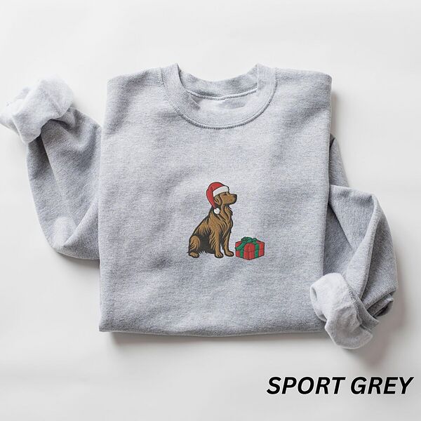Sport Grey crewneck sweatshirt laid flat, embroidered with a golden retriever in a Santa hat sitting next to a wrapped present