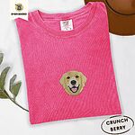 Crunchberry Comfort Colors T-shirt embroidered with a smiling golden retriever face with a pink tongue