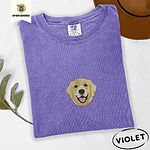 Violet Comfort Colors T-shirt embroidered with a smiling golden retriever face with a pink tongue