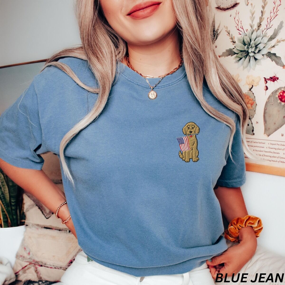 Goldendoodle American Flag Shirt – Blue Jean Woman in a Blue Jean T-shirt with a small goldendoodle and USA flag embroidered on the left chest