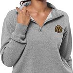 Woman in a heather grey quarter zip holding the collar, embroidered with a golden doodle face on the left chest
