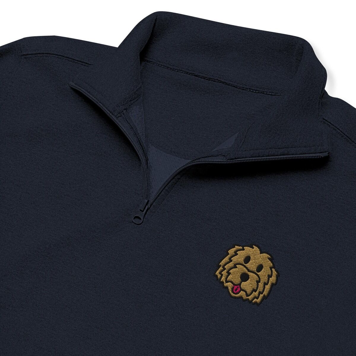 Goldendoodle Quarter Zip – Navy Close-up of a Navy quarter zip collar and chest, embroidered with a shaggy golden doodle face