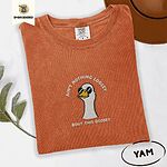 Yam Comfort Colors T-shirt embroidered with a cool white goose in black sunglasses with arched white lettering embroidered on the chest