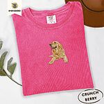 Crunchberry Comfort Colors T-shirt embroidered with a happy golden retriever lying down with its head up and tongue out