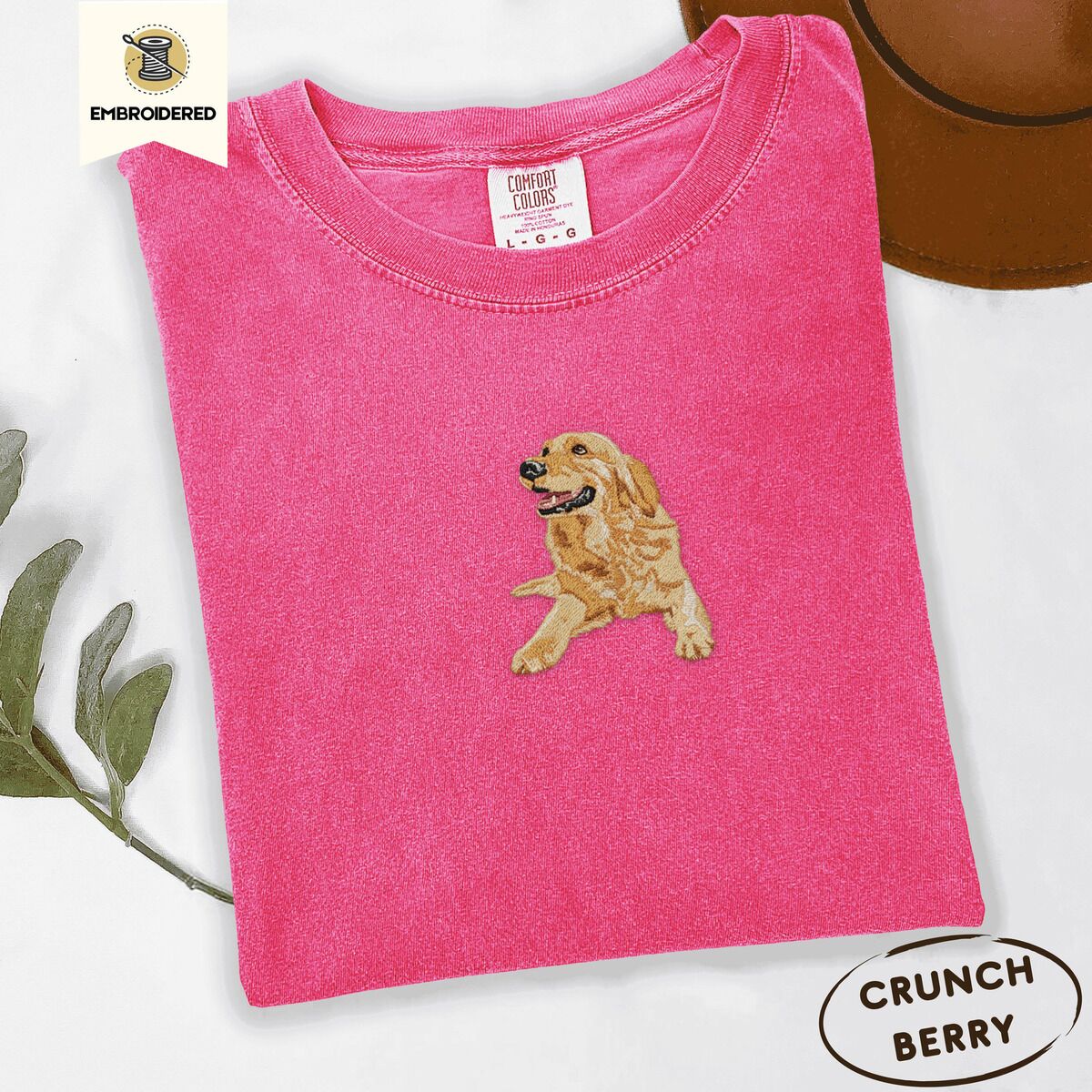 Happy Golden Retriever Shirt – Crunchberry Crunchberry Comfort Colors T-shirt embroidered with a happy golden retriever lying down with its head up and tongue out