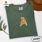 Moss Comfort Colors T-shirt embroidered with a happy golden retriever lying down with its head up and tongue out