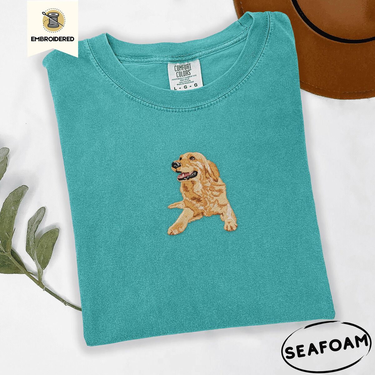 Happy Golden Retriever Shirt – Seafoam Seafoam Comfort Colors T-shirt embroidered with a happy golden retriever lying down with its head up and tongue out