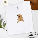 White Comfort Colors T-shirt embroidered with a happy golden retriever lying down with its head up and tongue out