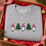 Kitty Christmas sweater gift: Sport Grey gnome cat sweatshirt folded in a gift box with red tissue paper