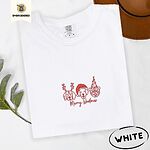 White Comfort Colors T-shirt embroidered with three red line-art dog faces in Christmas hats above Merry Woofmas script