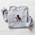 Sport Grey crewneck sweatshirt laid flat with rolled sleeves, a pit bull silhouette with an American flag stitched in the center
