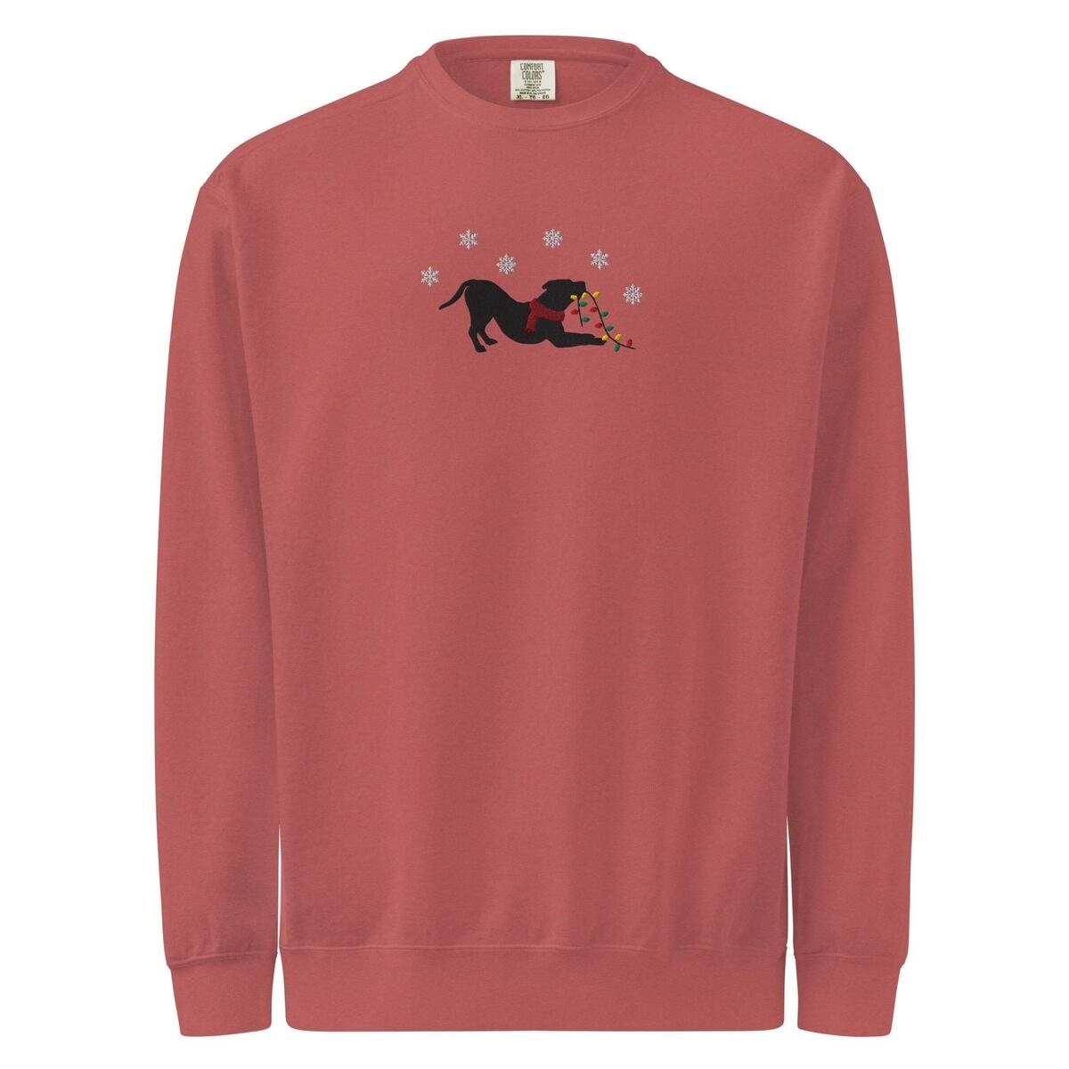 Pitbull Christmas Lights Sweatshirt – Crimson Crimson crewneck sweatshirt shown flat on a white background, embroidered with a black pitbull silhouette in a play bow with a red scarf, holding a string of Christmas lights under white snowflakes