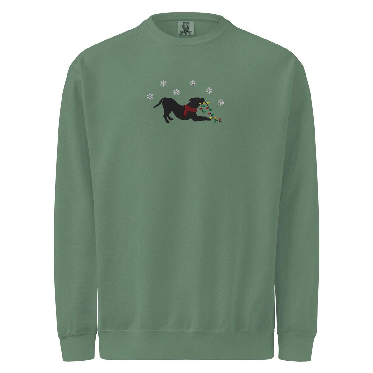 Pitbull Christmas Lights Sweatshirt – Light Green Light Green crewneck sweatshirt shown flat on a white background, embroidered with a black pitbull silhouette in a play bow with a red scarf, holding a string of Christmas lights under white snowflakes