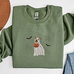Military Green crewneck sweatshirt laid flat with a felt hat and folded jeans, embroidered with a pit bull in a ghost sheet holding a jack-o'-lantern bucket between bats and sparkles