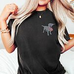 Woman in a Black T-shirt with a silver Labrador silhouette holding a small American flag on the left chest