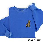 Flo Blue crewneck sweatshirt laid flat, embroidered with a small sitting golden retriever on the left chest