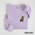 Orchid crewneck sweatshirt laid flat, embroidered with a small sitting golden retriever on the left chest