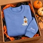 Standard Poodle Halloween sweatshirt folded in a gift box with mini pumpkins
