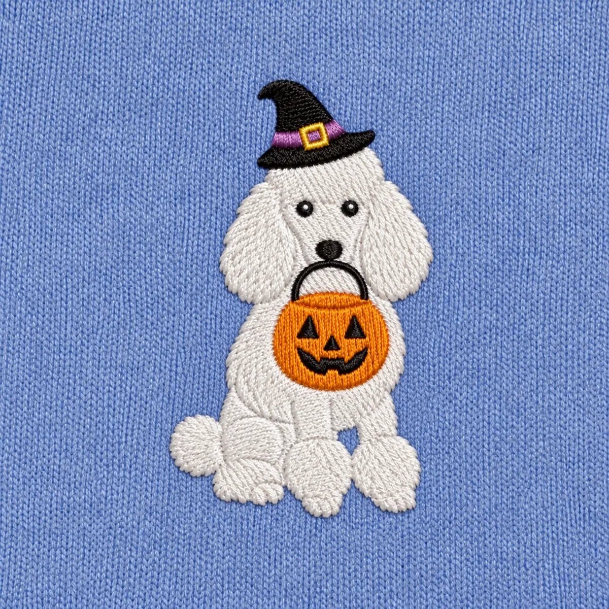 Standard Poodle Witch Hat Embroidery Close-up Close-up of the embroidered Standard Poodle in a witch hat with a jack-o'-lantern candy bucket