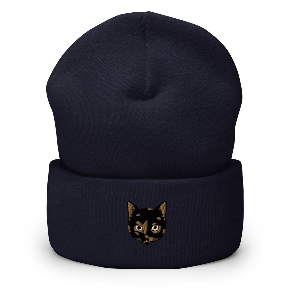 Tortie Cat Beanie Navy Navy cuffed knit beanie with a tortoiseshell cat face, black with caramel patches, embroidered on the cuff