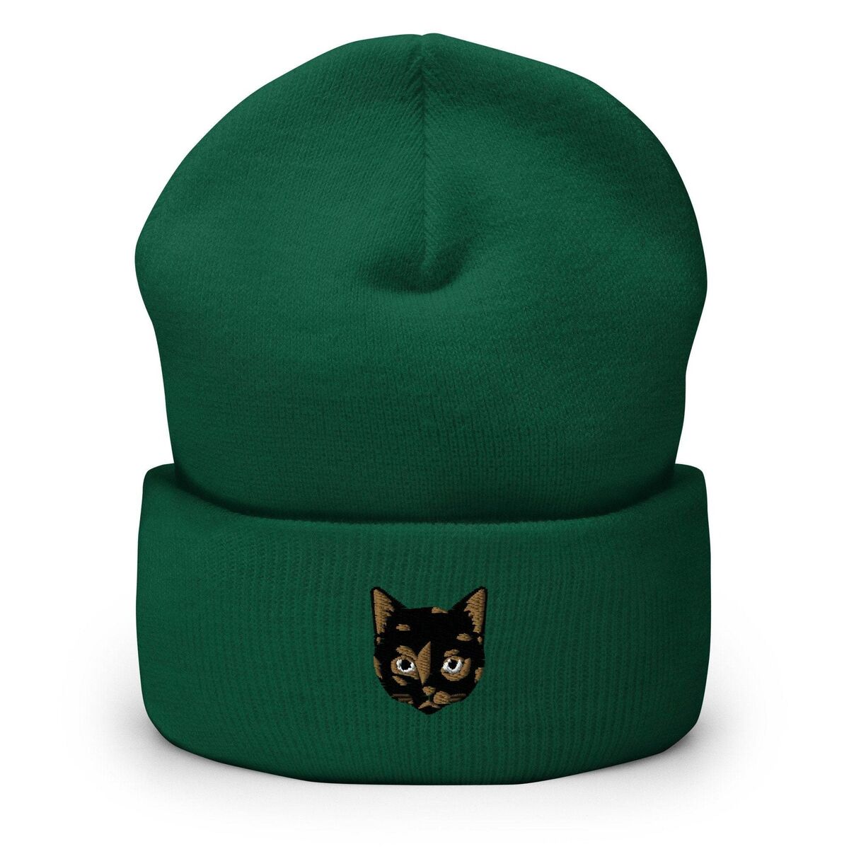 Tortie Cat Beanie Spruce Spruce cuffed knit beanie with a tortoiseshell cat face, black with caramel patches, embroidered on the cuff
