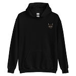 Black pullover hoodie laid flat on white, embroidered with a small tortoiseshell cat face, black with golden caramel patches, on the left chest