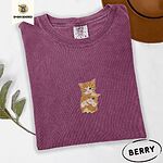 Berry Comfort Colors T-shirt embroidered with two orange tabby kittens, one winking with a paw on the other's head