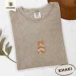 Khaki Comfort Colors T-shirt embroidered with two orange tabby kittens, one winking with a paw on the other's head