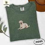 Moss Comfort Colors T-shirt embroidered with a smiling yellow Labrador lying down with its front paws stretched out