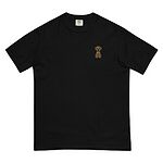Black T-shirt on a white background, embroidered with a small golden cartoon Labrador puppy sitting with floppy ears on the left chest