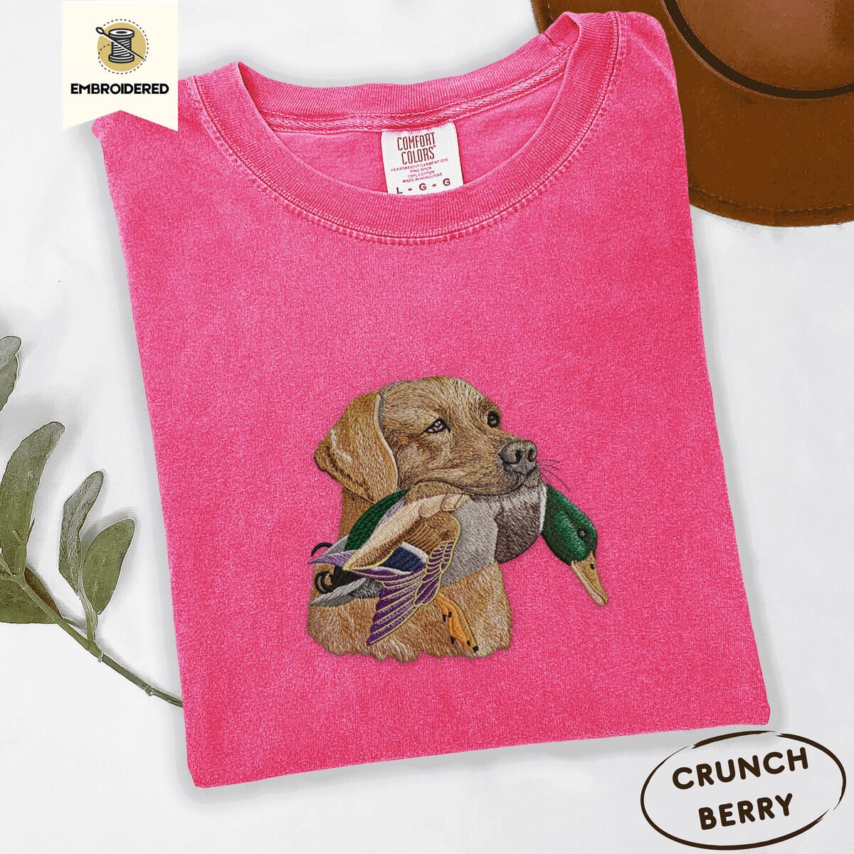 Yellow Lab Shirt – Crunchberry Crunchberry Comfort Colors T-shirt embroidered with a yellow Labrador head carrying a mallard drake in its mouth