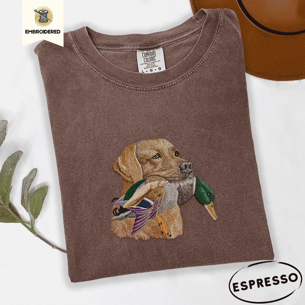 Yellow Lab Shirt – Espresso Espresso Comfort Colors T-shirt embroidered with a yellow Labrador head carrying a mallard drake in its mouth